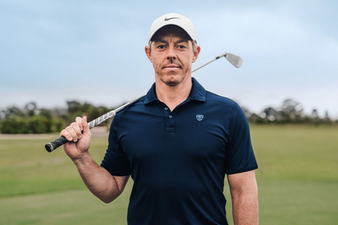 Rory McIlroy holding a golf club